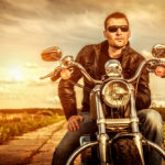 Bad boy macho man on motorcycle
