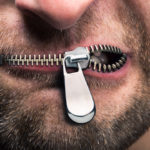 Man with zipped mouth