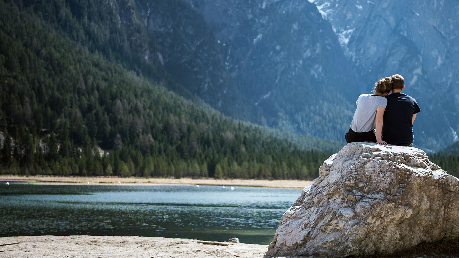 Married couple retreats to a rock