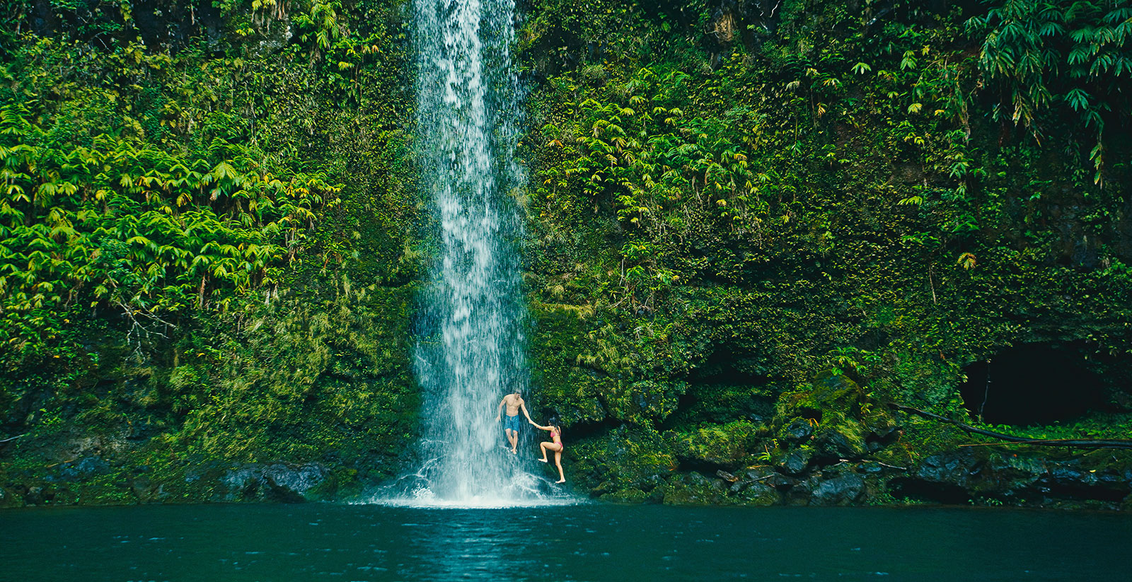 Happily counseled couple at Maui waterfall